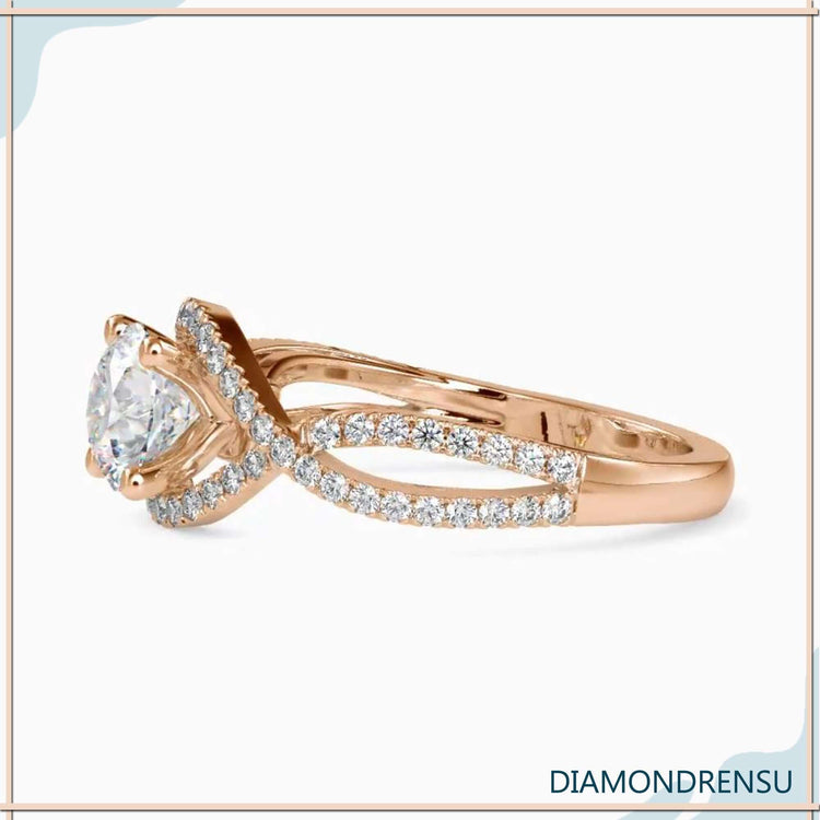 Lab grown diamond engagement ring featuring a 2 carat round cut diamond in a 4 prong ring setting.