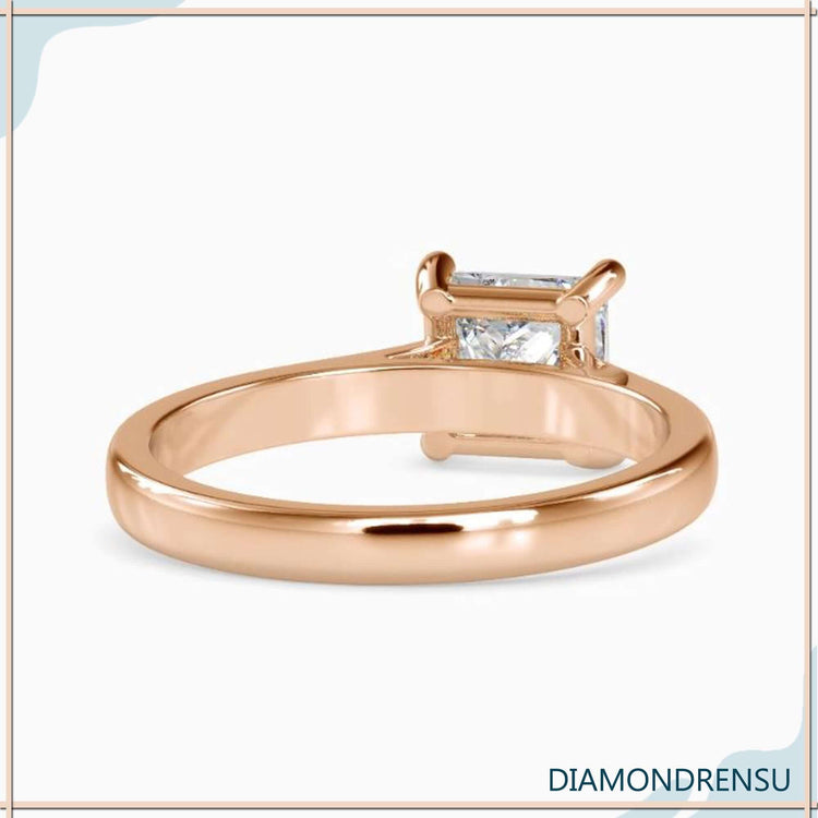 Solitaire princess cut engagement ring with a gold solitaire setting and Lab Grown Diamond.