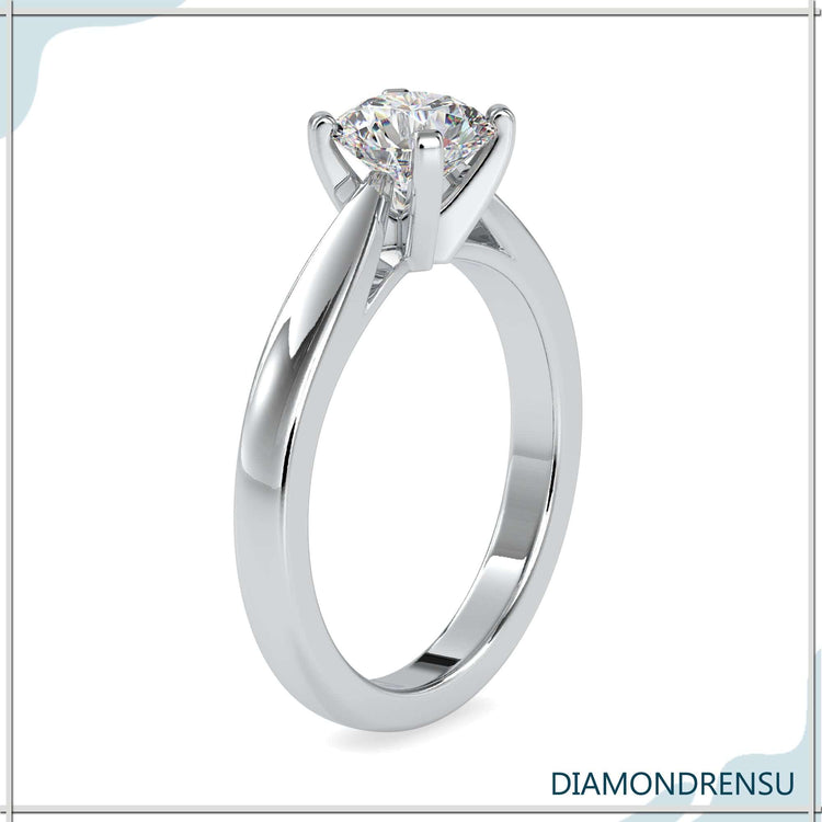 Round solitaire engagement ring with lab grown diamond and diamondrensu design