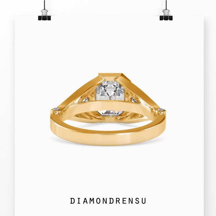 Split shank engagement ring with emerald cut diamond and pave details