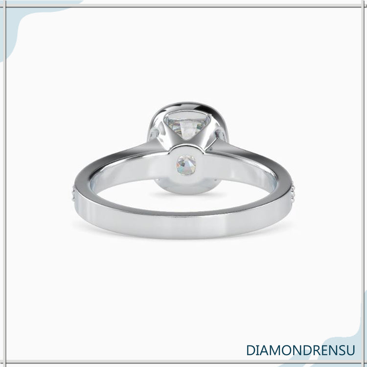 Bezel set engagement ring with a modern twist