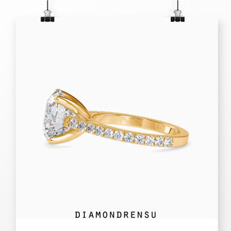 Diamondrensu engagement ring with a 1 carat round diamond and 4 prong round engagement ring style.