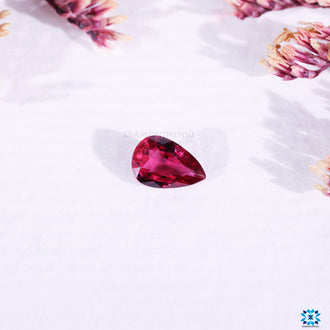 Pink ruby gemstone pear cut birthstone.