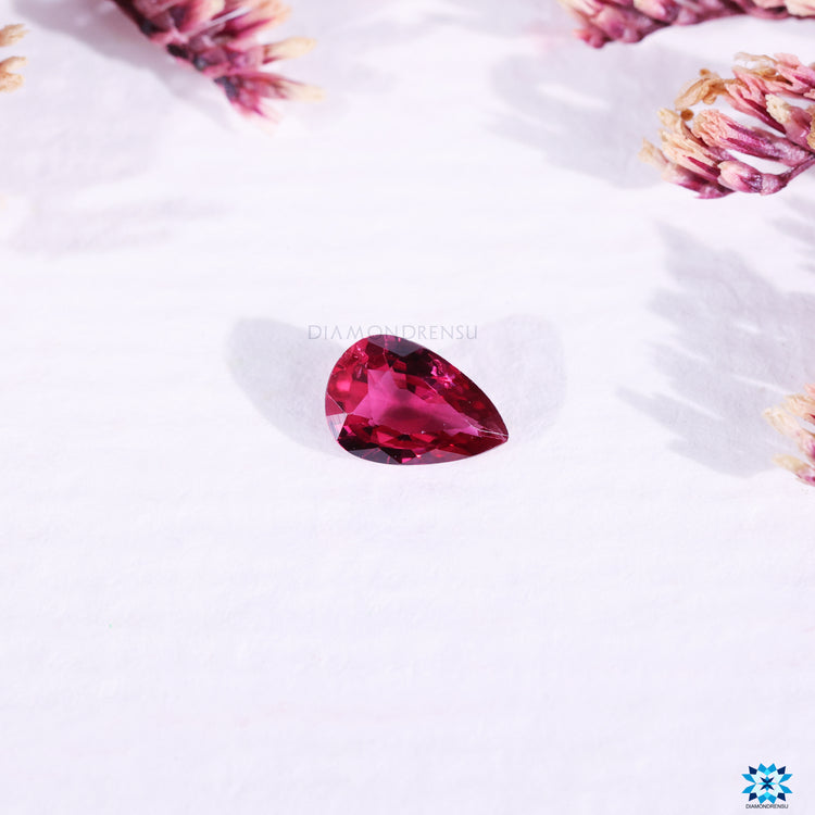 Pink ruby gemstone pear cut birthstone.