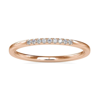 Round diamond gold band with minimalist design in yellow gold.