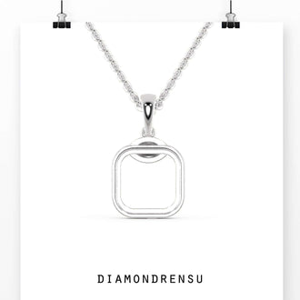 The diamond accented pendant shines with added brilliance.