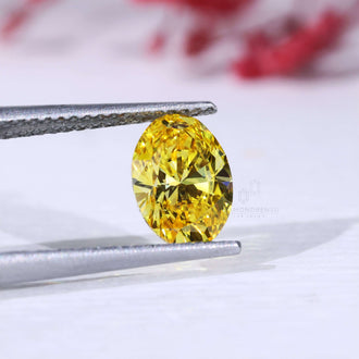 IGI certified yellow oval diamond loose stone.