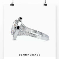Engagement ring oval cut diamond in a split shank and halo setting