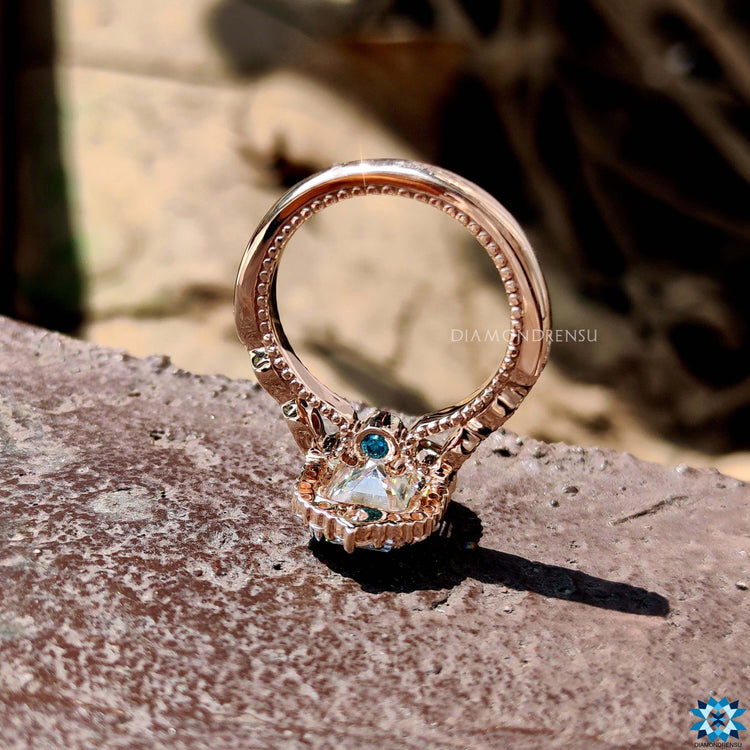 A radiant halo engagement ring featuring a sparkling moissanite center stone, adding an extra touch of brilliance.