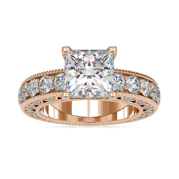 Princess cut engagement ring with sparkling diamonds in a pave setting.