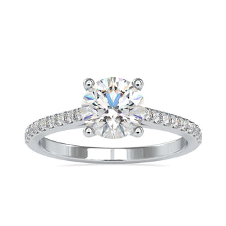 Handmade diamondrensu ring in a cathedral setting with a diamond prong setting for added brilliance.