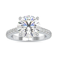 Round diamond engagement ring with a cathedral setting and 2 carat round diamond.