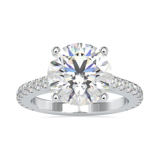 Round diamond engagement ring with a cathedral setting and 2 carat round diamond.