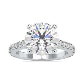 Round diamond engagement ring with a cathedral setting and 2 carat round diamond.