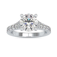 2 carat round diamond ring with a classic basket setting
