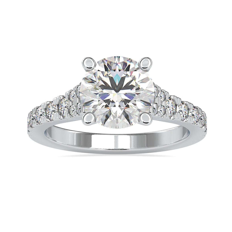 2 carat round diamond ring with a classic basket setting