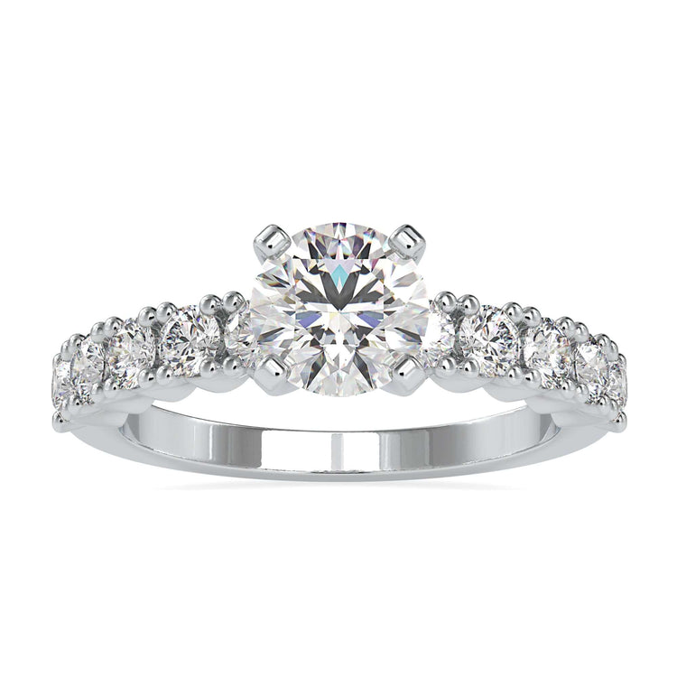 Timeless 4 prong diamond ring with a pave band and IGI certified diamond.