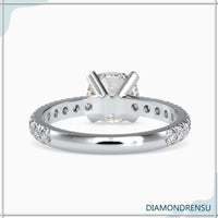 Pave engagement ring with a cushion cut diamond, available in rose, white, and yellow gold.