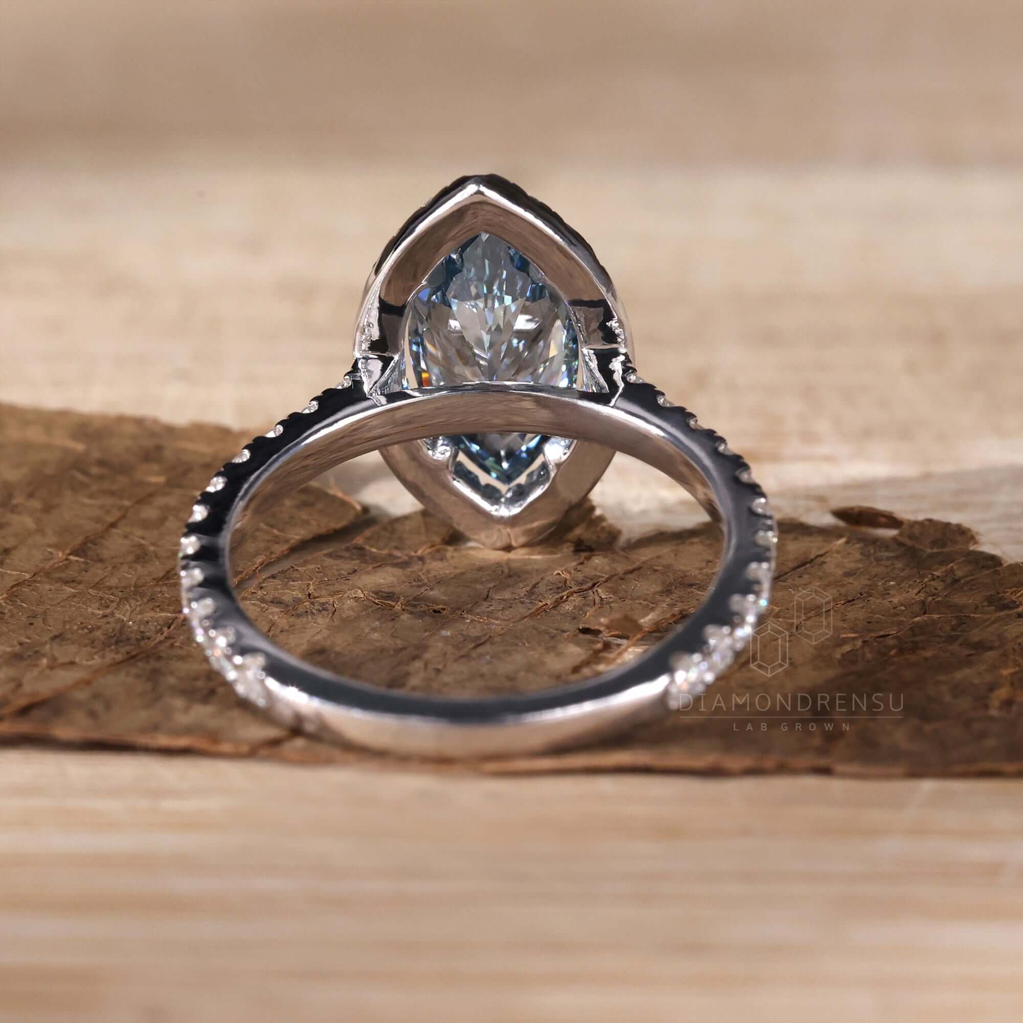 blue marquise diamond engagement ring