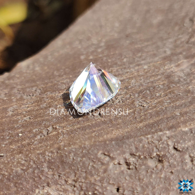 5.43 carat moissanite loose stone featuring a pear cut and colorless tone.