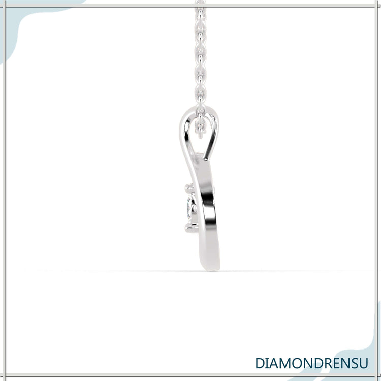 The diamond pendant necklace shines with brilliant clarity.