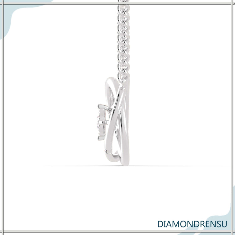 Handmade jewelry featuring a round cut diamond pendant in white gold.
