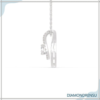 A small pendant with chain adds a delicate, simple touch.
