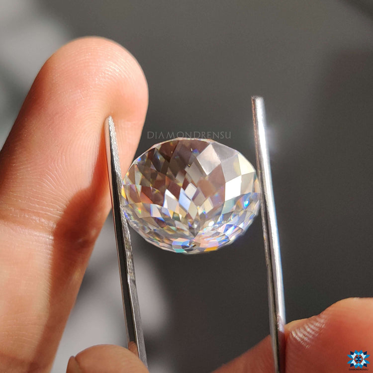 Moissanite stone features antique cut moissanite.