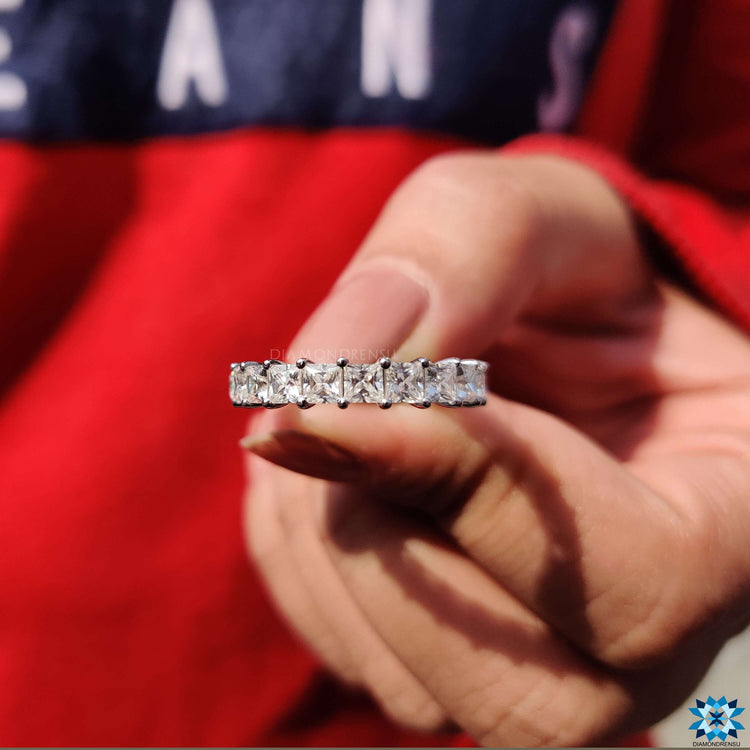 Beautiful square band crafted with high-quality colorless moissanite in a round prong setting.