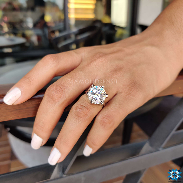 Moissanite solitaire engagement ring in a classic design.