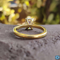 Handmade elongated cushion moissanite ring with unique style.