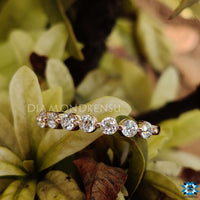 Moissanite half eternity ring with a sleek and stylish look.