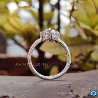 Unique round cut solitaire ring with sparkling craftsmanship.