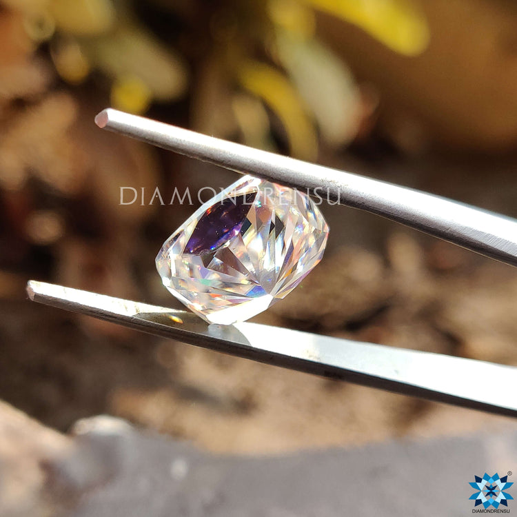 Cushion cut moissanite stone in colorless grade.