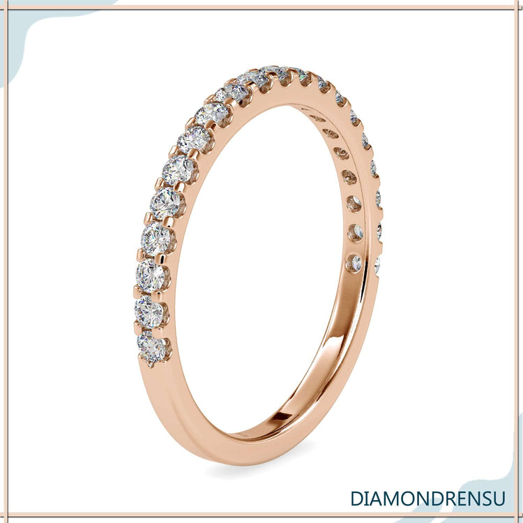 Shared prong engagement ring with a matching diamond pave band