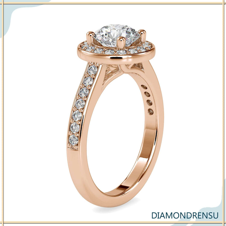 Beautiful engagement ring with halo crafted in a cathedral setting ring design.