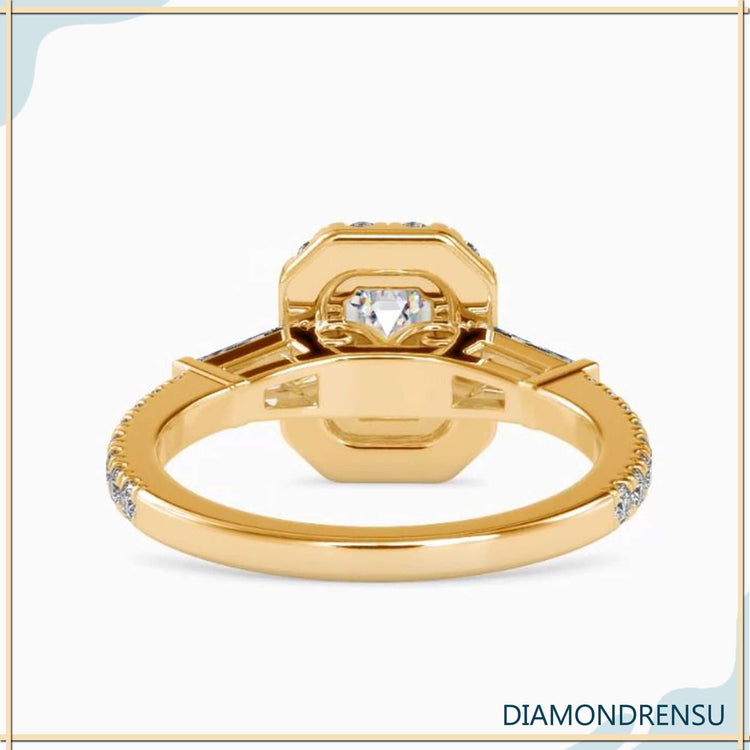 tapered baguette engagement ring setting with emerald cut diamond.