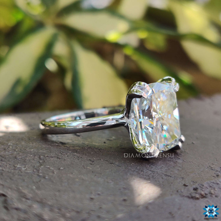 Cushion moissanite ring with a unique handmade finish.