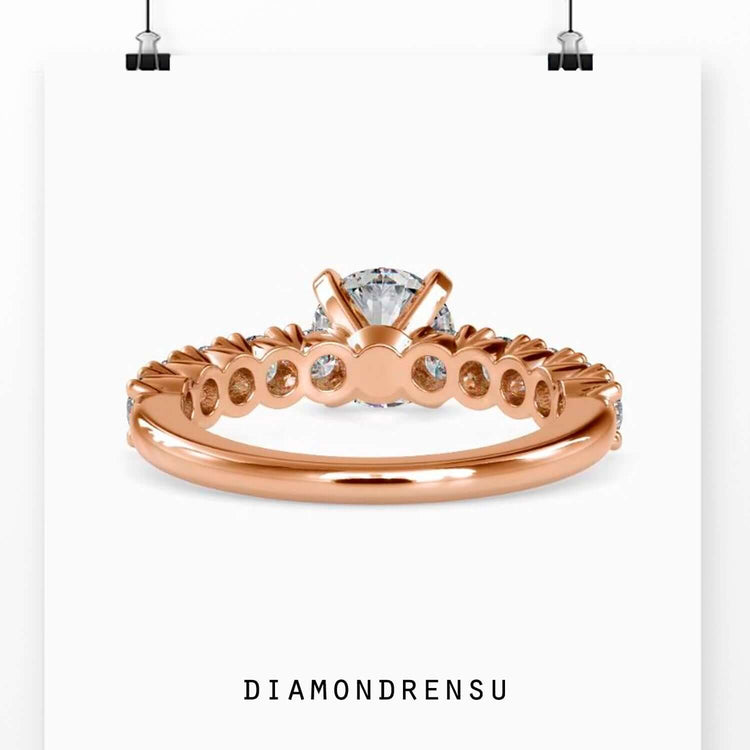 Exquisite 4 prong engagement ring featuring a round brilliant cut diamond.