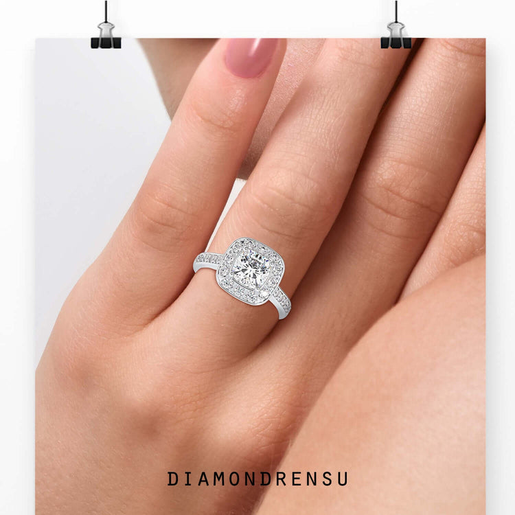 Beautiful cushion cut halo engagement ring with a pave ring setting for added brilliance.