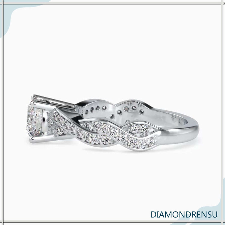 Gorgeous round engagement ring with a 4 prong setting and a basket design.