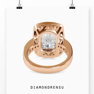 Timeless diamond halo engagement ring with an elongated cushion cut diamond centerpiece.