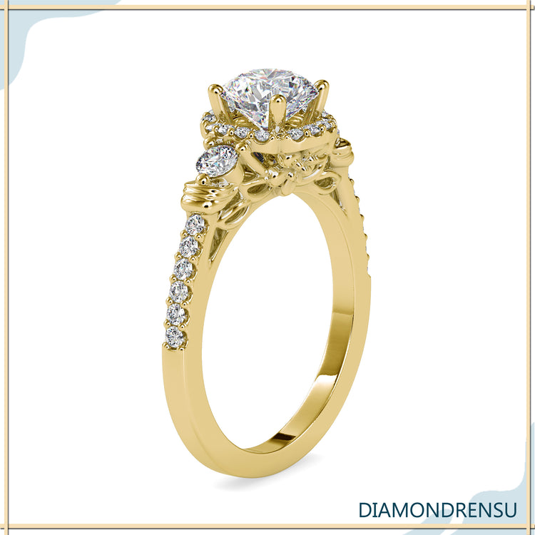 Pave engagement ring with floral accents and a round diamond center.