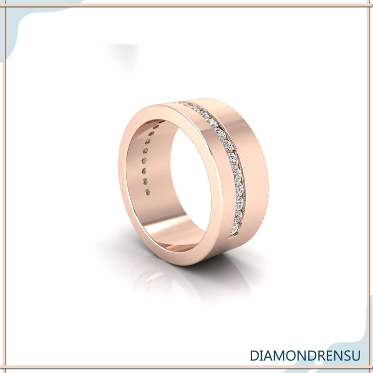 Mens gold wedding bands featuring a classic round diamond setting.