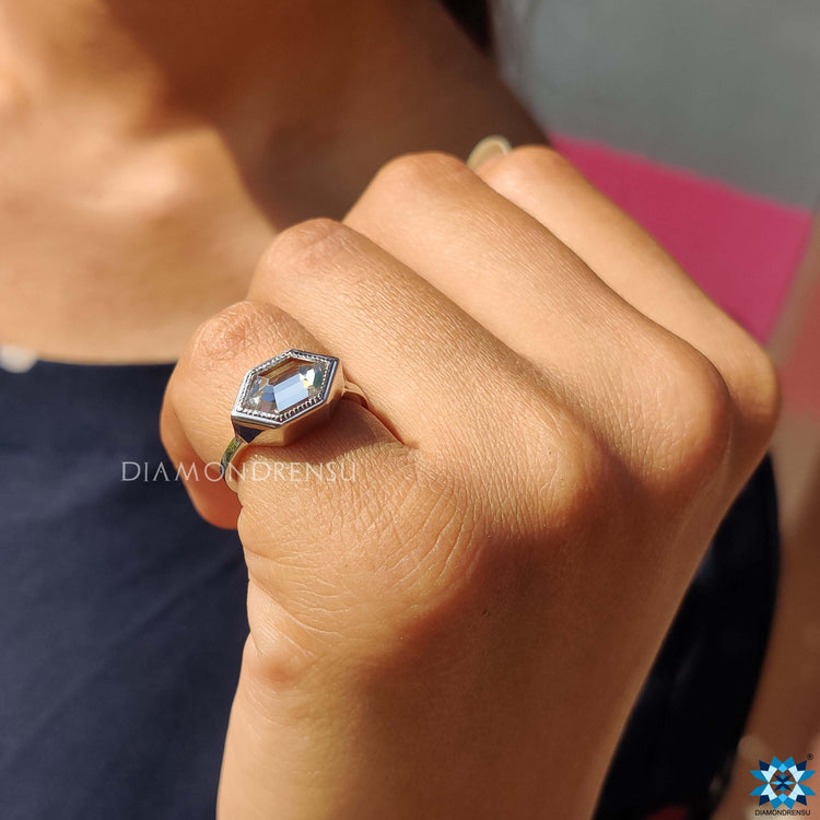 Milgrain engagement ring showcasing handcrafted sophistication.