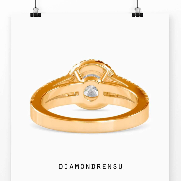 Diamond split shank ring with a halo round diamond and a 4 prong engagement ring style.