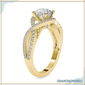 Round diamond solitaire engagement ring with a 4 prong diamond ring setting and bridge accents.