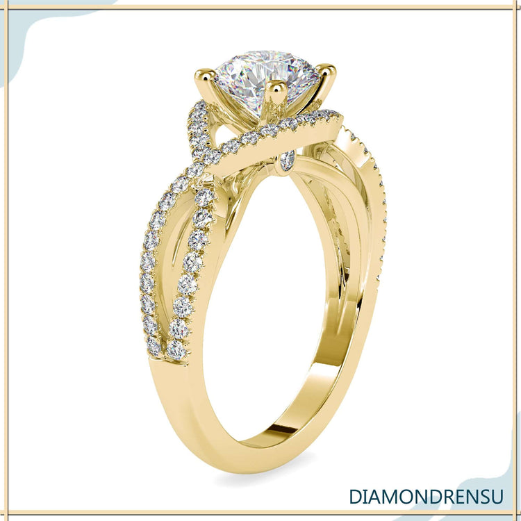 Round diamond solitaire engagement ring with a 4 prong diamond ring setting and bridge accents.