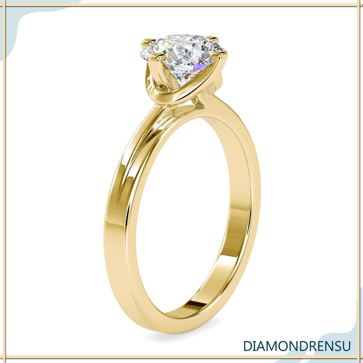 Round diamond solitaire engagement ring with a radiant sparkle.
