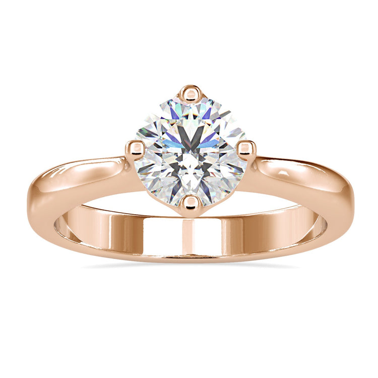 Round diamond engagement ring with a classic 4 prong setting.